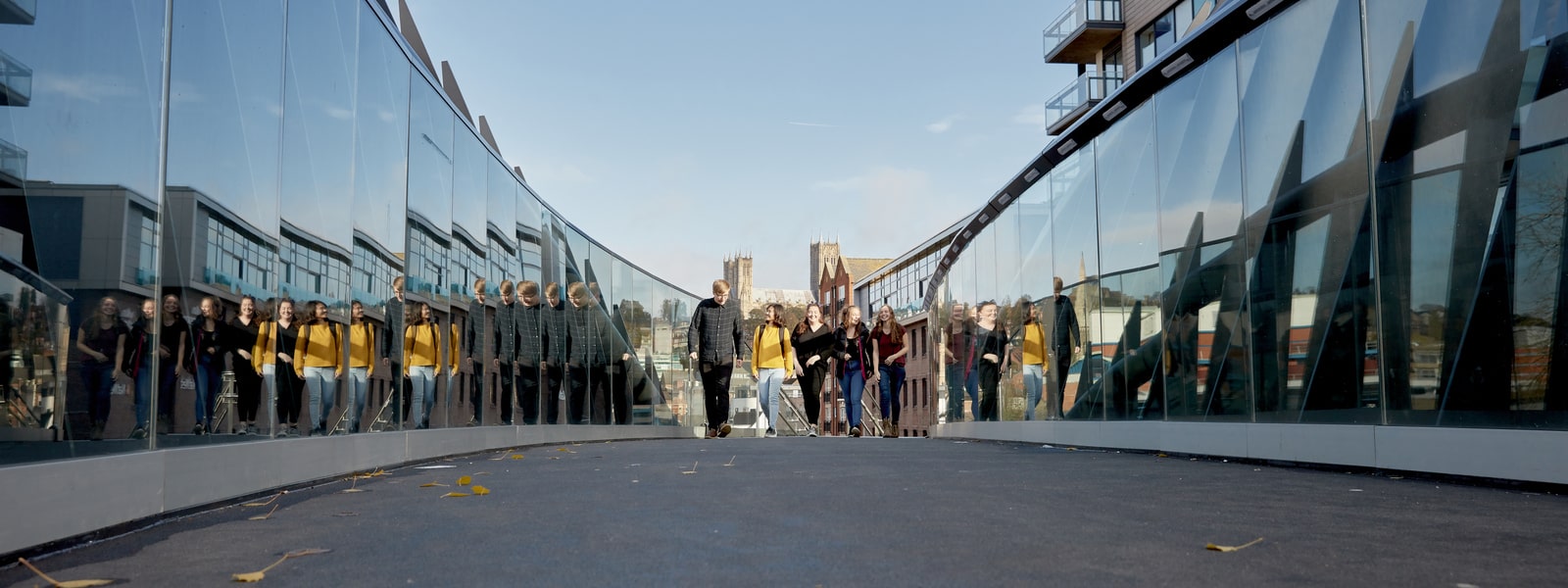 Students walking on bridge
