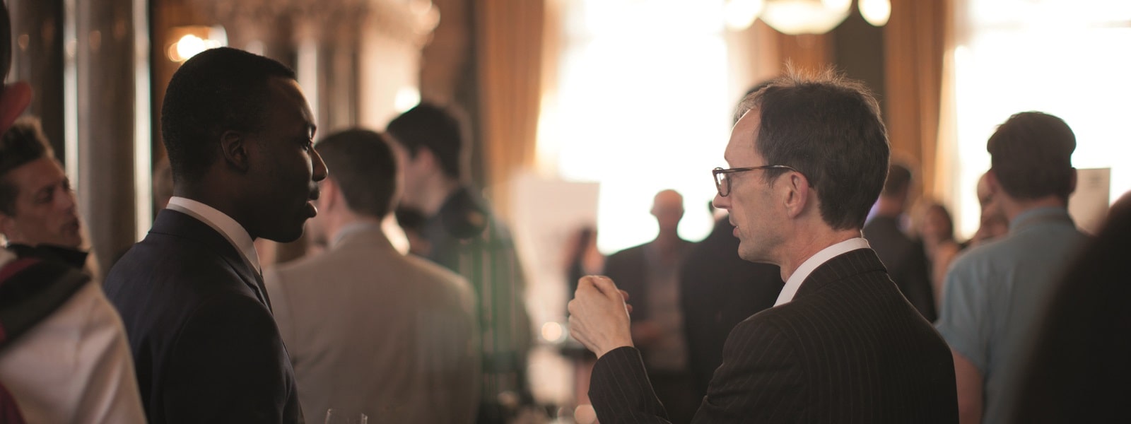 Alumni networking at event