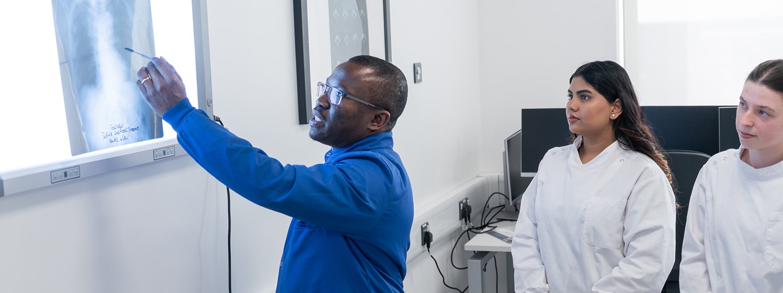 Students looking at an x-ray